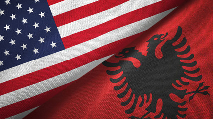 United States and Albania two flags textile cloth, fabric texture