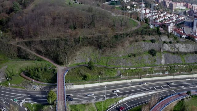 Aerial; drone view of Bilbao capital of Basque country; city panorama with modern architecture and contemporary art objects; new life of ancient city; the combination of old town and modern urbanism