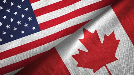 Fotobehang United States and Canada two flags textile cloth, fabric texture © Oleksii