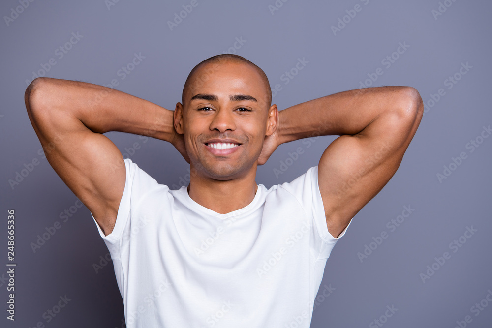 Poster close up photo relaxed strong healthy masculine dark skin he him his macho bald head arms behind fin