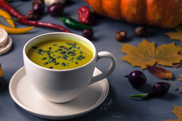 Pumpkin asian coconat cream soup. Autumn hot food