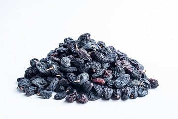 Black currant dried on white background
