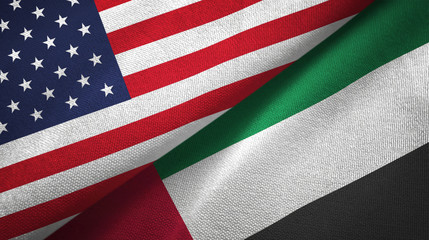 Obraz premium United States and United Arab Emirates two flags textile cloth, fabric texture