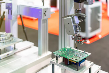 High technology and modern automatic robot for pcb (print circuit board) assembly machine during...