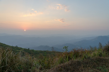 Mountain field during sunset. Beautiful natural landscape, Kanchanaburi, Thailand