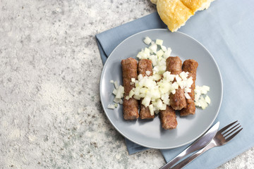 Balkan grill cevapi and shopska salad