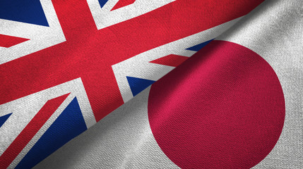 United Kingdom and Japan two flags textile cloth, fabric texture