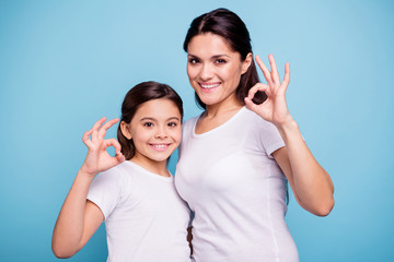 Close up photo beautiful two people brown haired mom little daughter hugging best friends look...