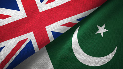 United Kingdom and Pakistan two flags textile cloth, fabric texture