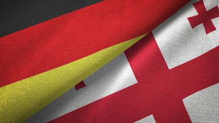 Germany and Georgia two flags textile cloth, fabric texture