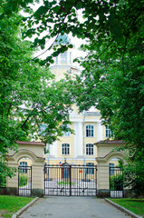 Beautiful church building behind a metal gate.