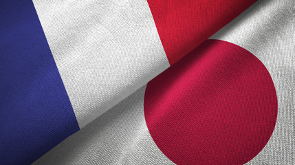 Fototapeta premium France and Japan two flags textile cloth, fabric texture