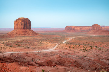 Amazing landscape of Monument Valley on a sunny summer sunset