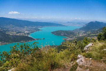 Fototapeta na wymiar Altitude Panorama over Annecy Lake and French Haute Savoie Valley on a Sunny Summer Day