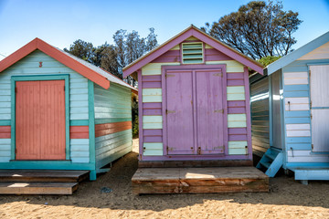 Fototapeta na wymiar Colorful huts on the beach