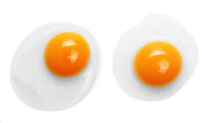 Raw eggs with yolks isolated on white background, top view