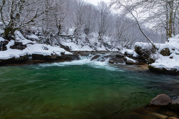 River with azure waters in the winter