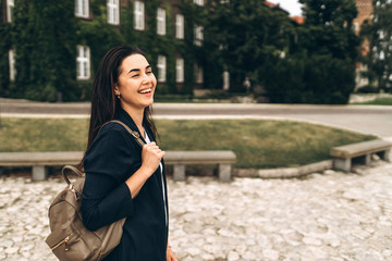 Fototapeta premium Pretty pan asian tourist girl walking in the tourist place outdoor.