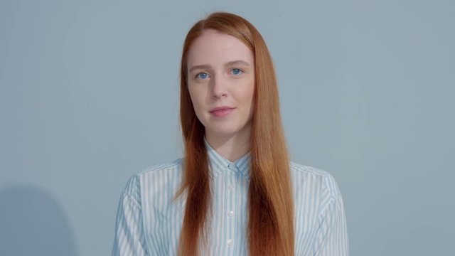 beauty gingerhead model with straight hair bite her lips
