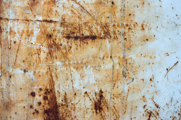 iron sheet in white paint with rusty spots