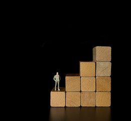 Obraz premium man on top of the career ladder