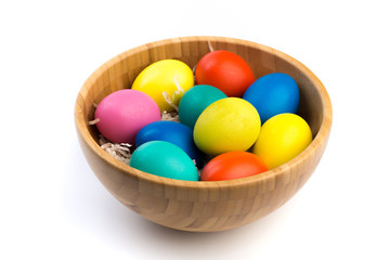 easter eggs in wooden bowl