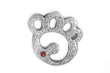 Obraz premium Unique bear foot pendant also used by the gay LGBT Bear community as their symbol in shades of brown