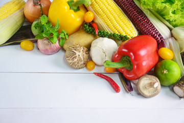 Raw organic vegetables on white wooden background, Healthy food.