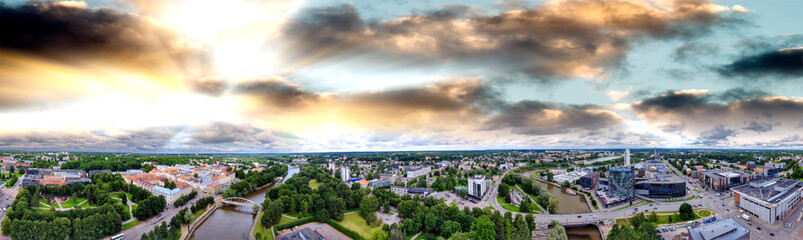 Fototapeta premium Panoramic sunset aerial view of Tartu skyline, Estonia