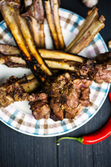 barbecue veal ribs with meat on a plate