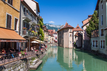 Fototapeta na wymiar Annecy Canal and Streets on a Sunny Summer Day with Blue Sky