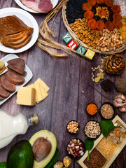 text Zinc, Ingredients or products containing zinc and dietary fiber on wooden board, natural sources of minerals