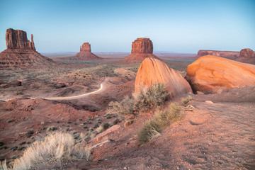 Amazing landscape of Monument Valley on a sunny summer sunset