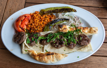 Turkish kofte meat balls with bulgur cereals and bread