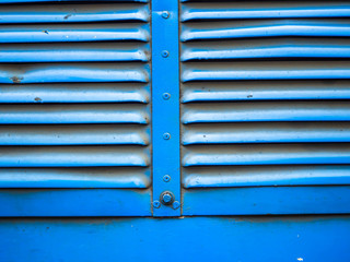 Abstract vivid blue and red stripes pattern of metal or steel texture for background.