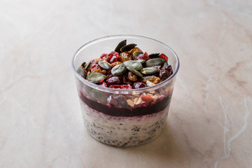 Healthy Chia Pudding with Pumpkin Seeds / Acai Bowl in Plastic Cup