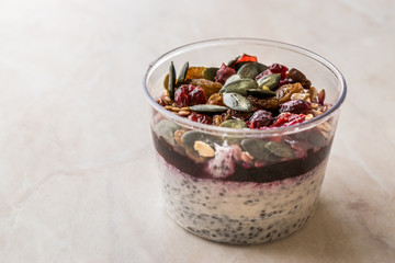 Healthy Chia Pudding with Pumpkin Seeds / Acai Bowl in Plastic Cup