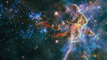 Nebula night starry sky in rainbow colors. Multicolor outer space. deep space many light years far from planet Earth. Elements of this image furnished by NASA. - Image