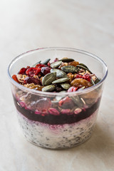 Healthy Chia Pudding with Pumpkin Seeds / Acai Bowl in Plastic Cup