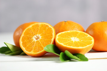 Fresh oranges fruit on white table background.