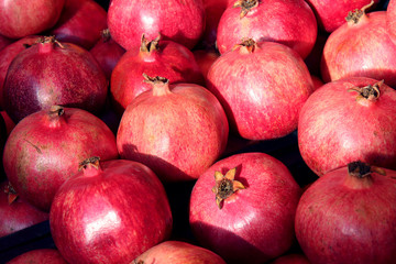 Rows Of Pomegranates. Pomegranate Closeup, Background. Group Of Ripe Pomegranates