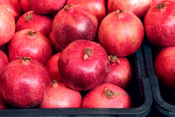 Rows Of Pomegranates. Pomegranate Closeup, Background. Group Of Ripe Pomegranates