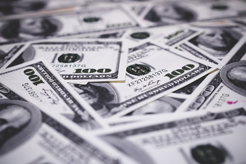 A pile of hundred dollar bills