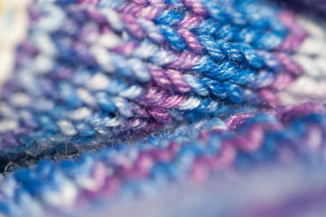 Obraz premium Seamless knitted patterns in pastel colors macro with selective focus