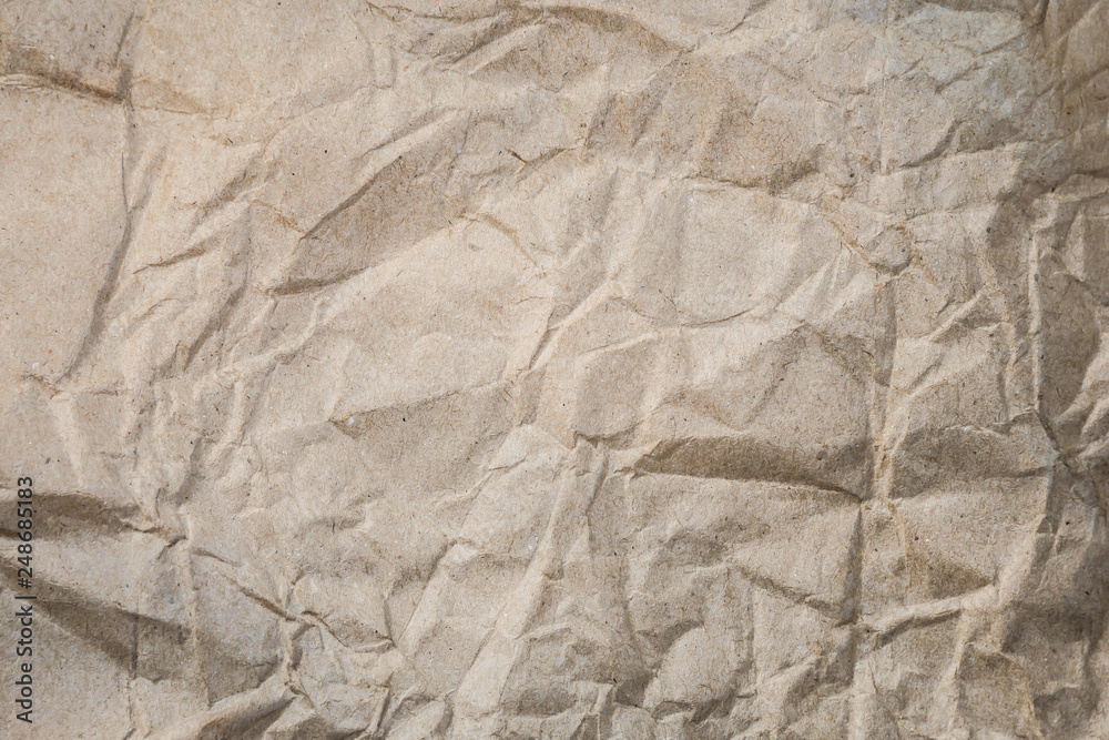 Poster brown crumpled paper background for backdrop composition for website magazine or graphic design back