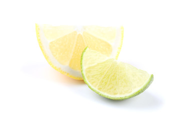 Pieces of lemon and lime isolated on white background