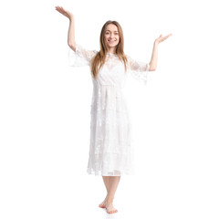 Woman in white dress summer spring laced goes happy hands up on white background isolation