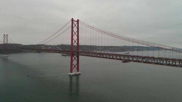 April 25 Bridge aerial view on a cloudy day, Lisbon - Portugal