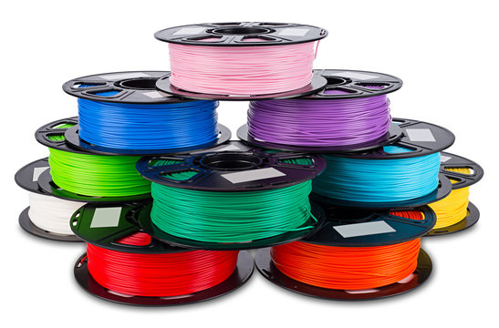 colorful bright stack pile of spool 3d printer filament
