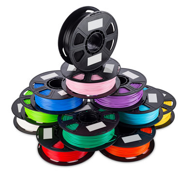 colorful bright stack pile of spool 3d printer filament